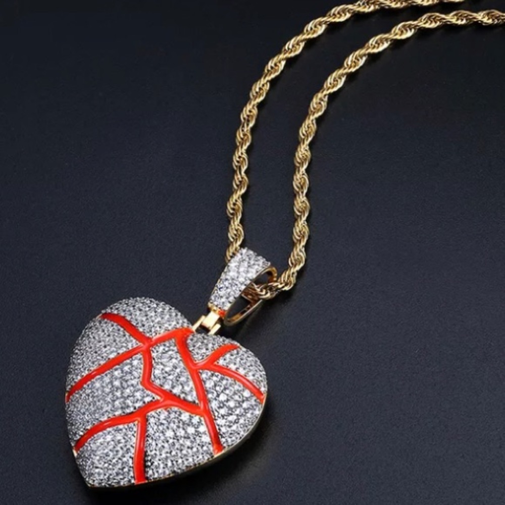 Iced out cracking heart pendant with rope chain